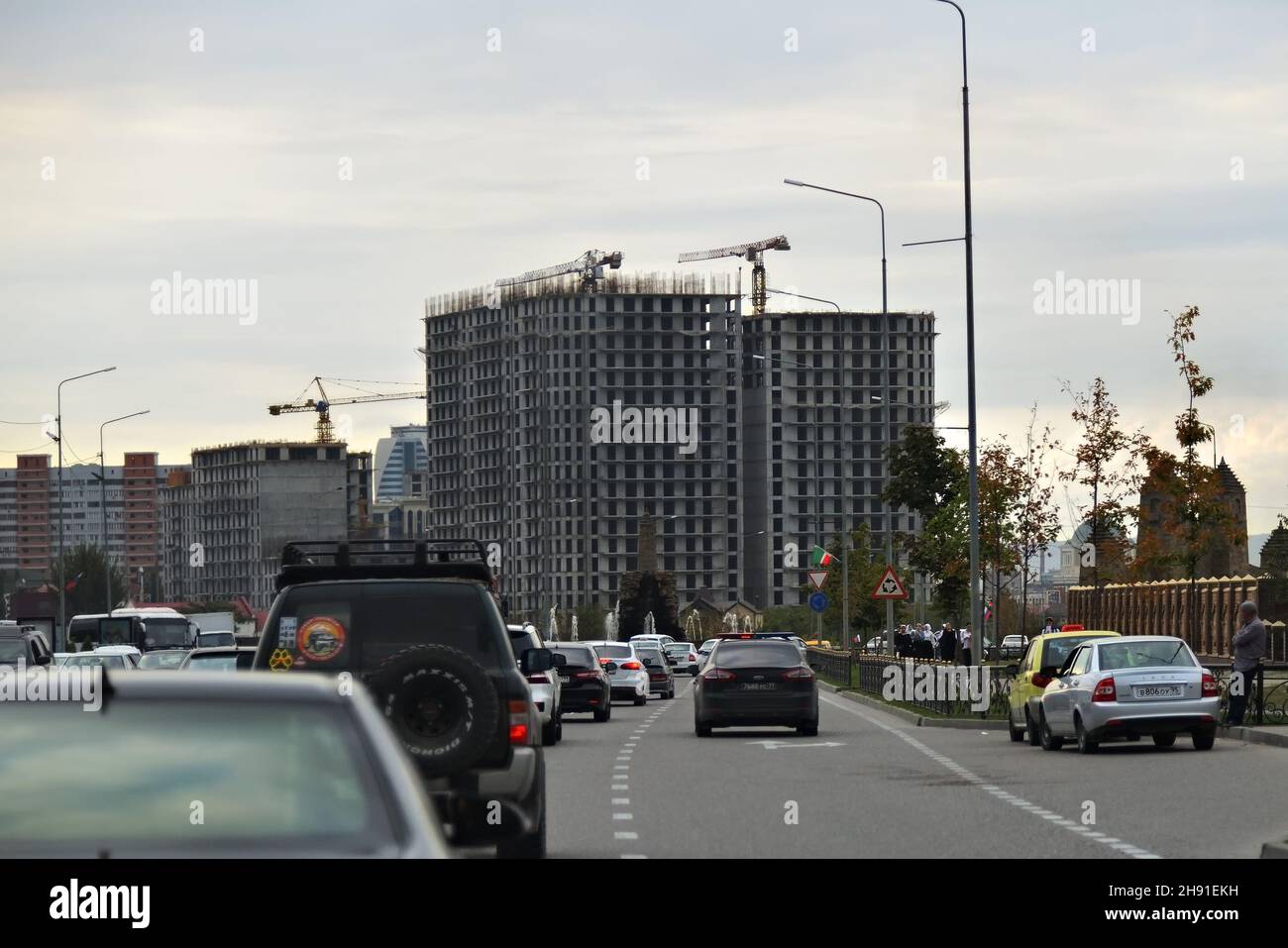 Grozny, Russia - Sept 13, 2021: Evening traffic jam and view on the new construction in capital city of the Chechen Republic in the Russian Federation Stock Photo