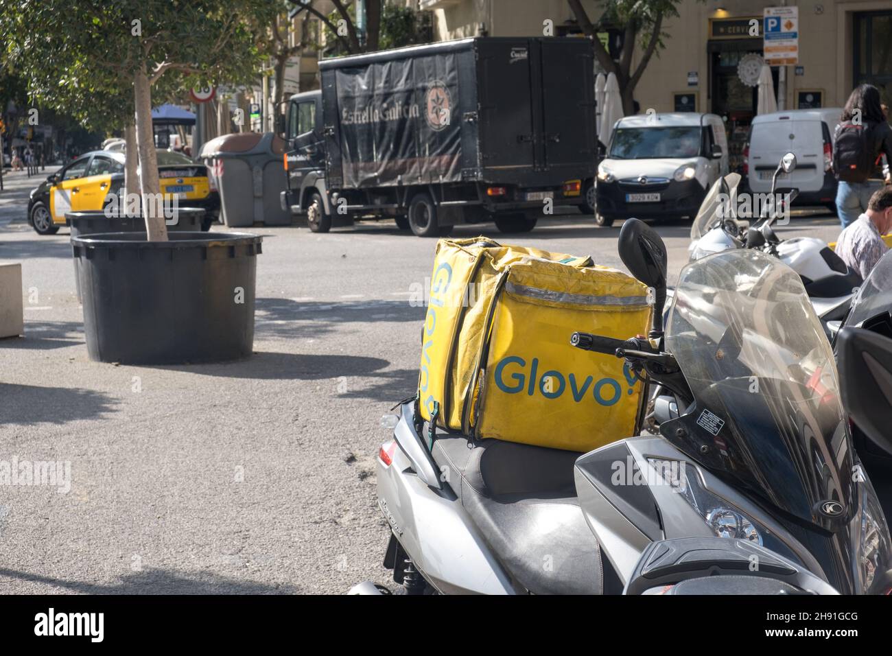 Barcelona, Spain - 5 November 2021: Glovo app service delivery box on scooter outdoor, Illustrative Editorial. Stock Photo
