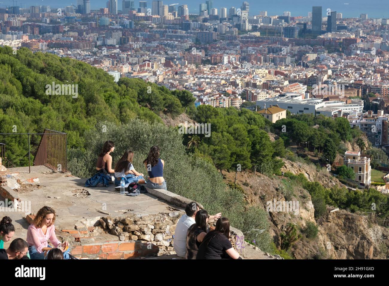 Barcelona, Spain - 5 November 2021: People looking at Barcelona with aerial view, Spain girl tourists, Illustrative Editorial. Stock Photo