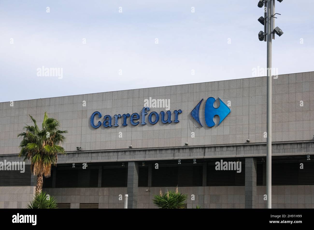 Barcelona, Spain - 5 November 2021: Carrefour company sign symbol, Illustrative Editorial. Stock Photo