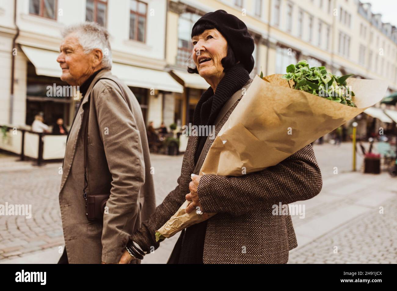 Senior couple exploring city during weekend Stock Photo