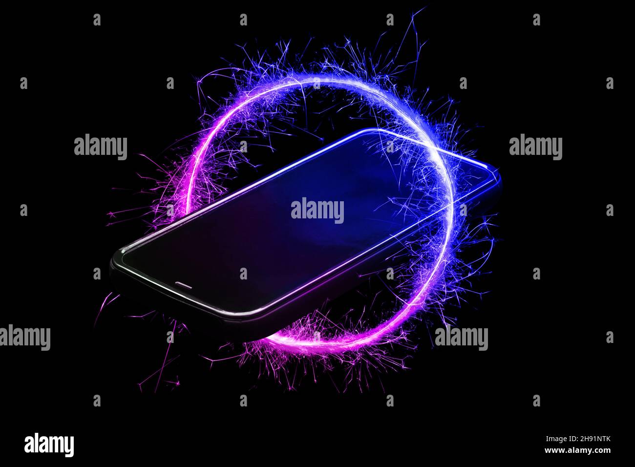 Smartphone with neon glow. Metaverse, virtual reality, blockchain, web3. Stock Photo