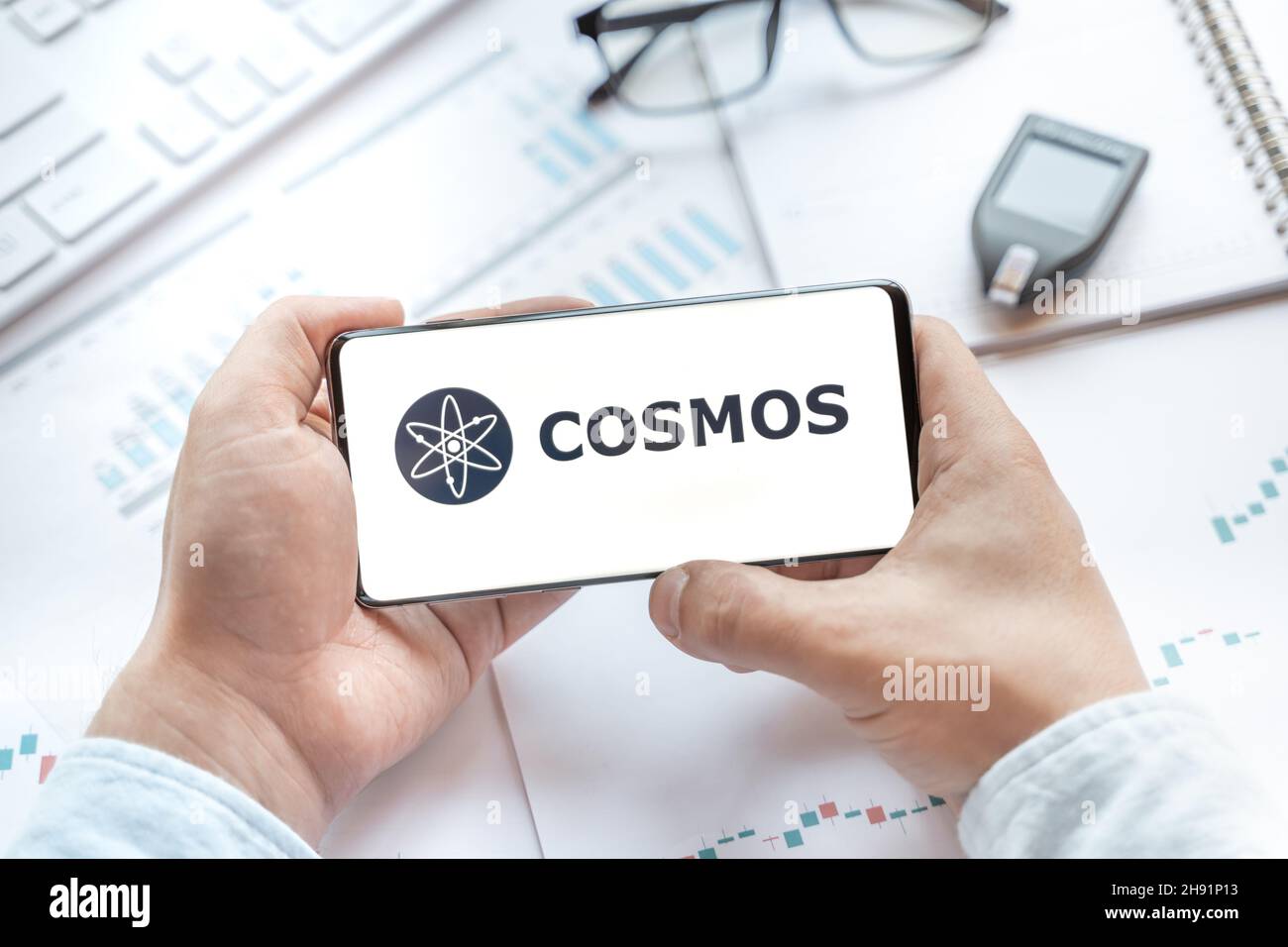 Logo of Atom coin in tablet. Cryptocurrency Cosmos token. Trading blockchain  platform to buy,sell on decentralized exchange DEX,DEFI. Digital money.Bu  Stock Photo - Alamy