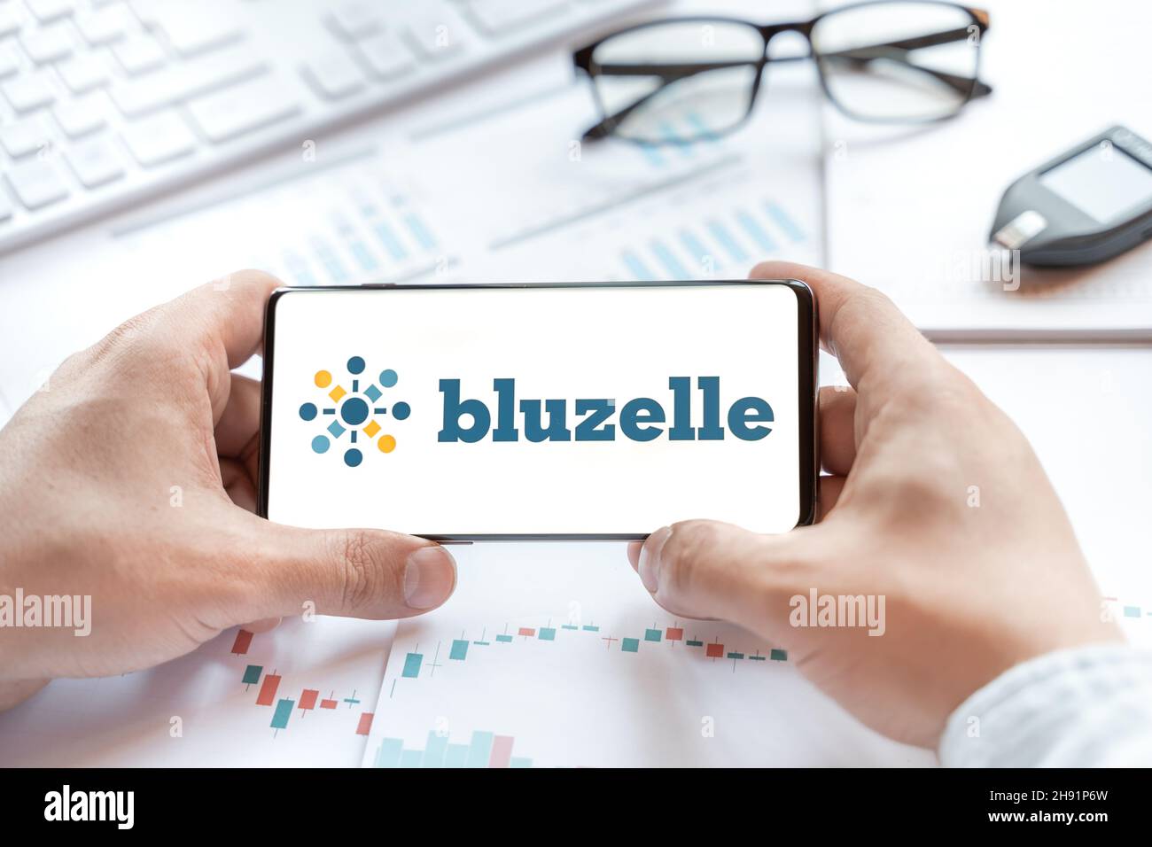 Logo of Bluzelle coin in tablet. Cryptocurrency BLZ token. Trading  blockchain platform to buy,sell on decentralized exchange DEX,DEFI. Digital  money.B Stock Photo - Alamy