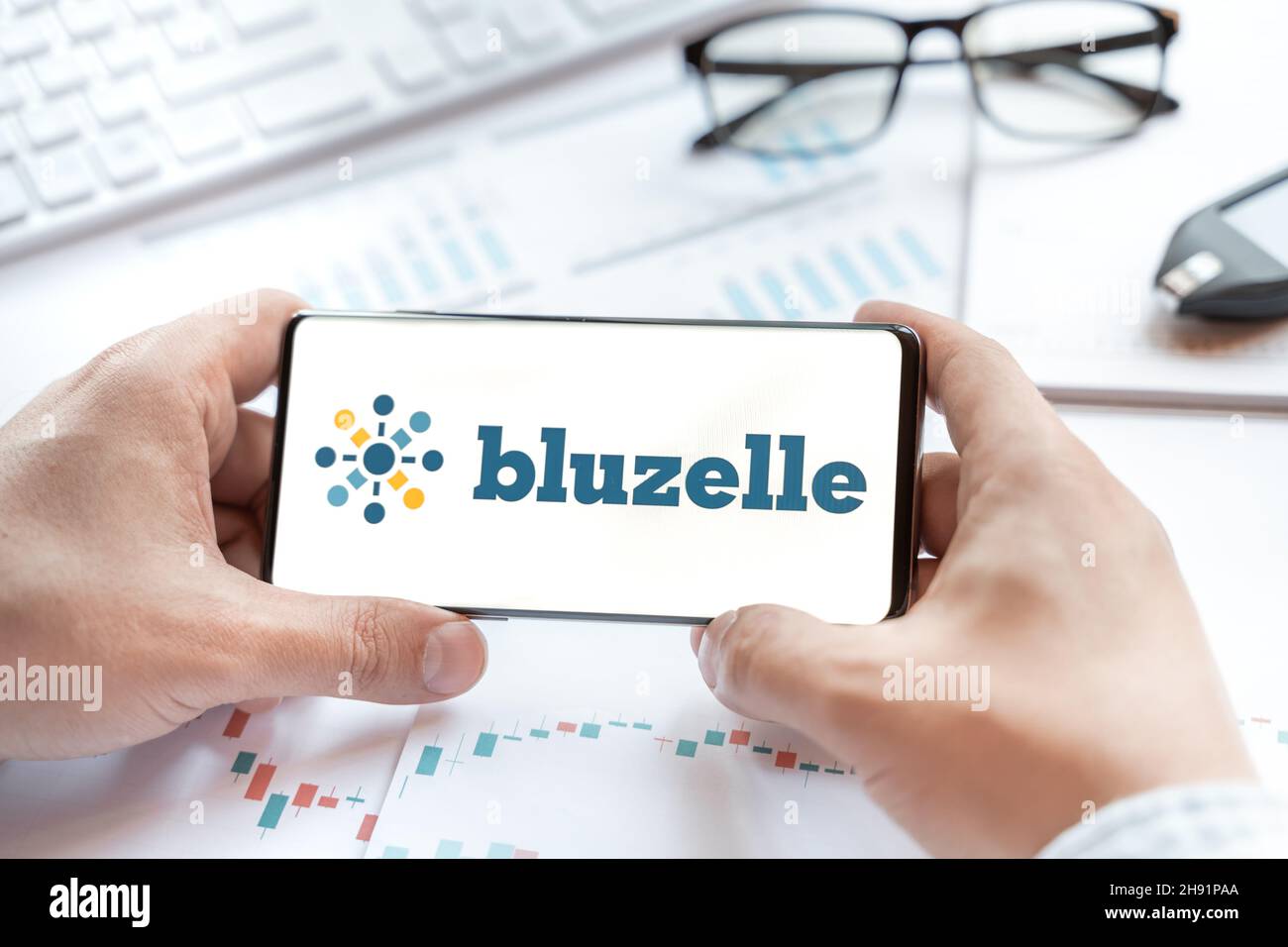 Logo of Bluzelle coin in tablet. Cryptocurrency BLZ token. Trading  blockchain platform to buy,sell on decentralized exchange DEX,DEFI. Digital  money.B Stock Photo - Alamy