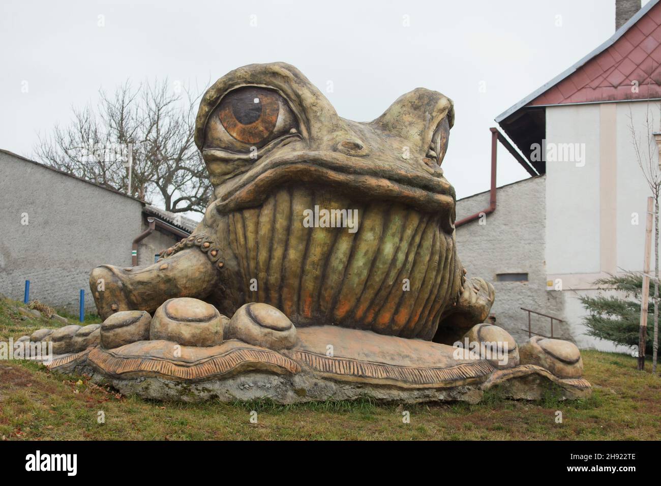 Huge statue of a toad designed by Czech sculptor Michal Olšiak (2009) in Tršice near Olomouc in North Moravia, Czech Republic. A toad is also depicted in the coat of arms of the village of Tršice. Stock Photo