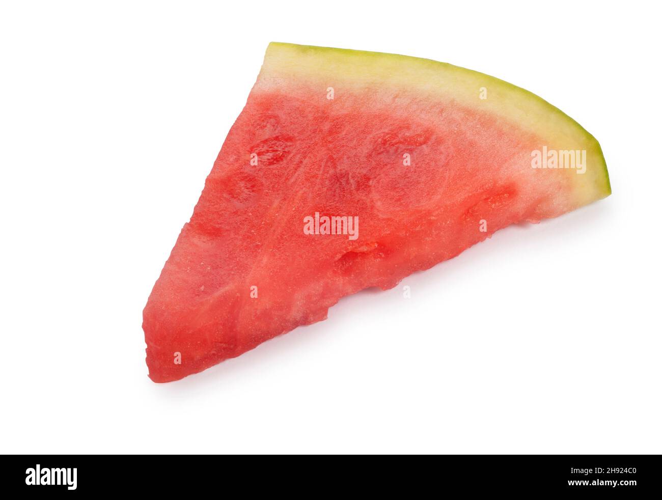 Studio shot of a slice of watermelon cut out against a white background - John Gollop Stock Photo
