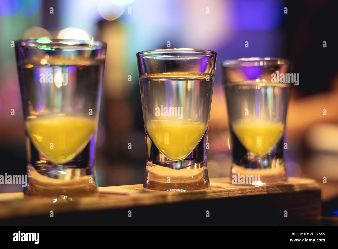 A row of vodka shots in the bar Stock Photo Alamy