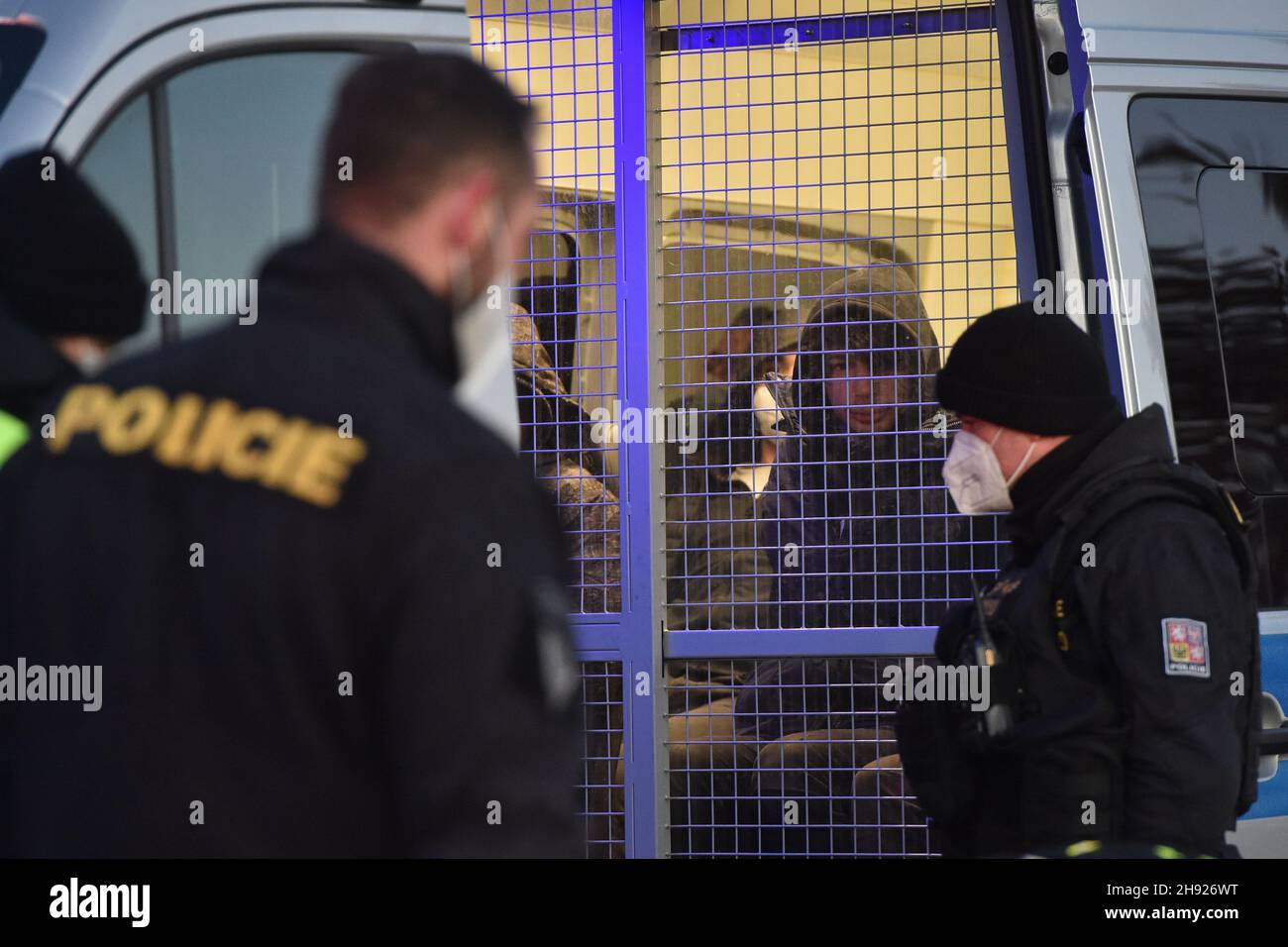 Lanzhot, Czech Republic. 03rd Dec, 2021. The south Moravian police detained 26 migrants in two separate cases in Czechia's southernmost Breclav district, Czech Republic, December 3, 2021, the first vehicle, a VW Sharan, being stopped for a road check and the other, a Chrysler Voyager, halted by a patrol in a civilian car after a several-minute pursuit. Credit: Vaclav Salek/CTK Photo/Alamy Live News Stock Photo