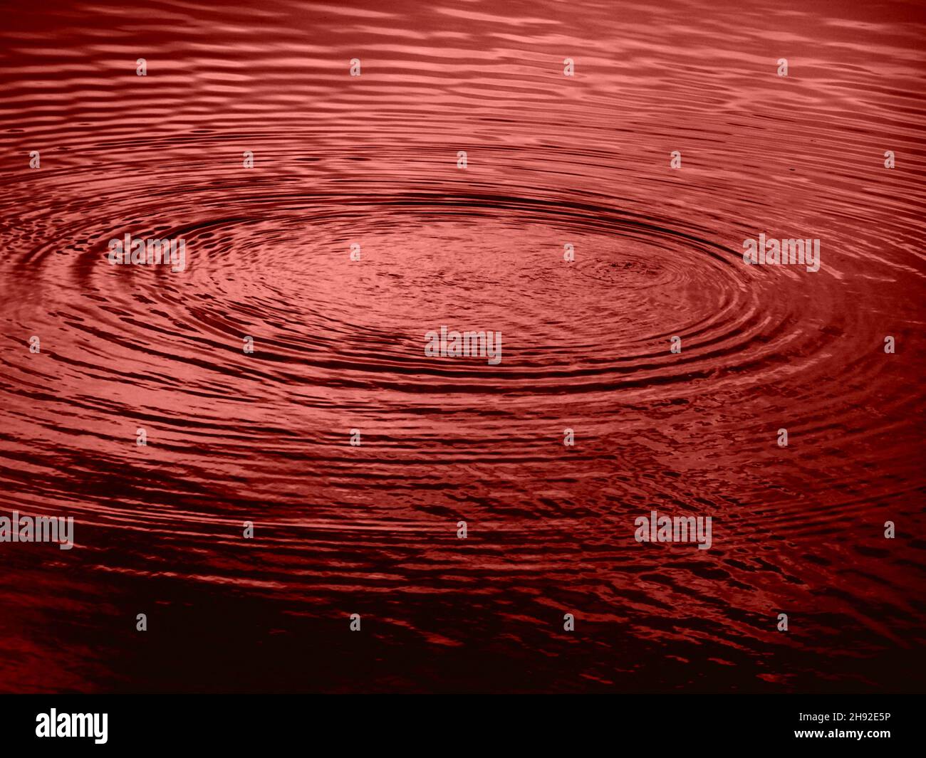 Radial effect on bloody water Stock Photo