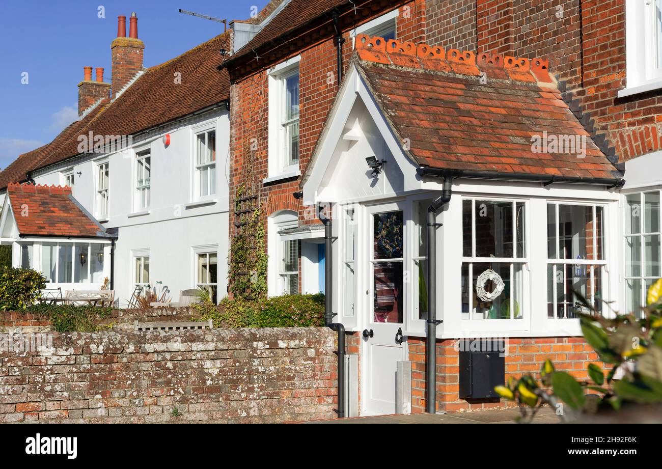Traditional houses and cottages in the picturesque seaside village of Bosham in Chichester Harbour, near Chichester, West Sussex, England, UK Stock Photo