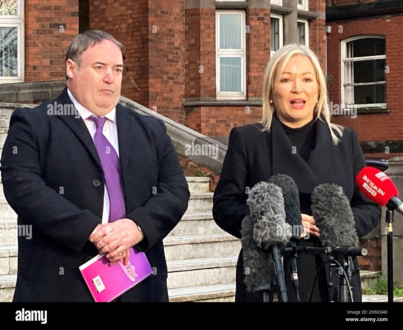 Northern Ireland deputy First Minister Michelle O'Neill accompanied by Stormont health committee chairman Colm Gildernew speaks to media at the Mater Hospital in Belfast following a meeting with the Royal College of Surgeons. See PA story HEALTH Coronavirus. Photo credit should read: Rebecca Black/PA Wire Stock Photo