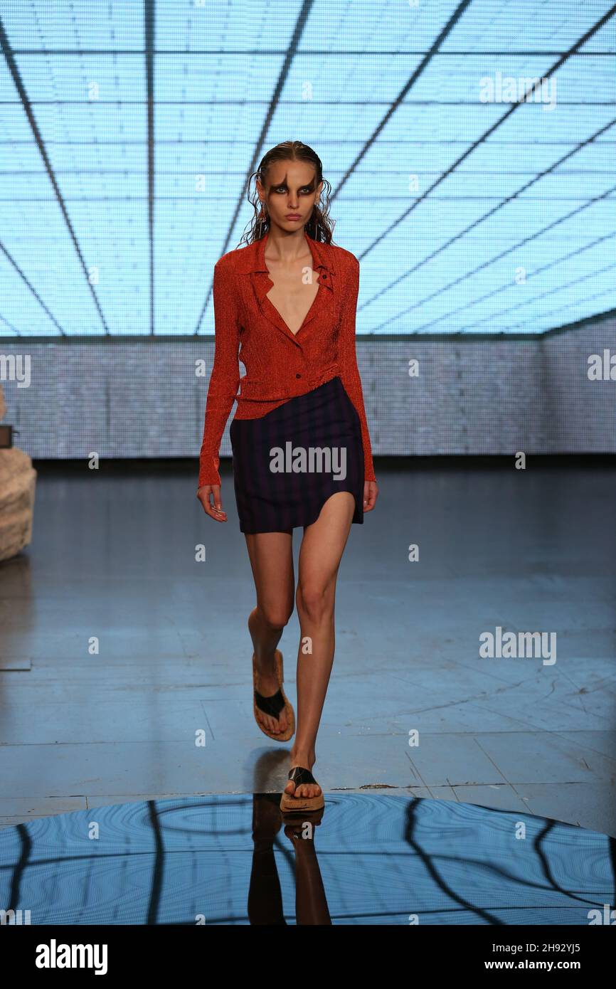 A Model walks the runway at the Eftychia Fashion show, during the London Fashion Week. Stock Photo