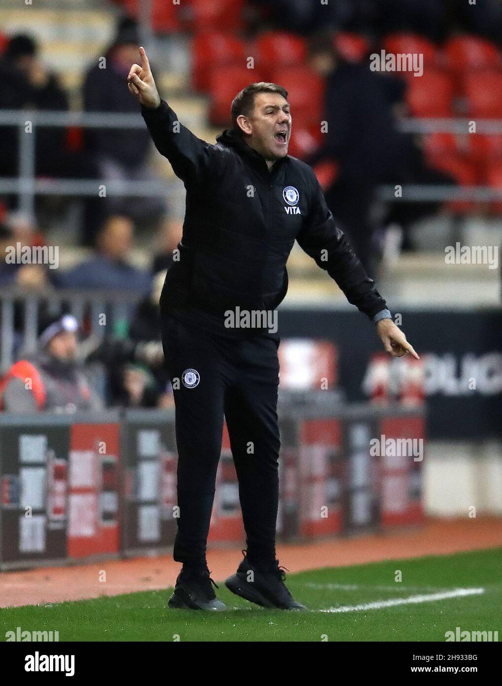 Stockport County manager Dave Challinor gestures on the touchline