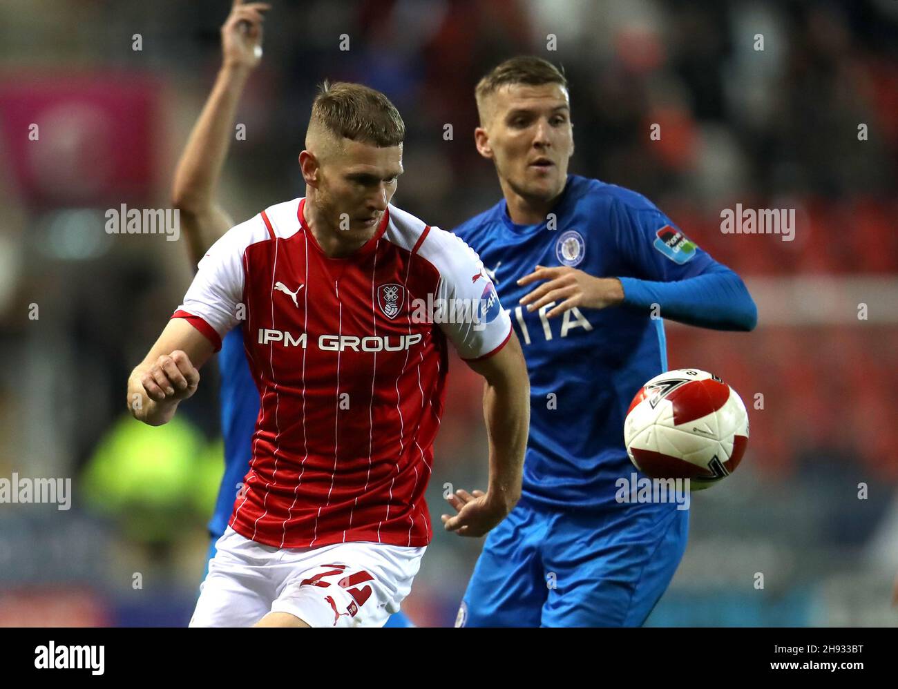 Rotherham United's Michael Smith (left) and Stockport County's Mark