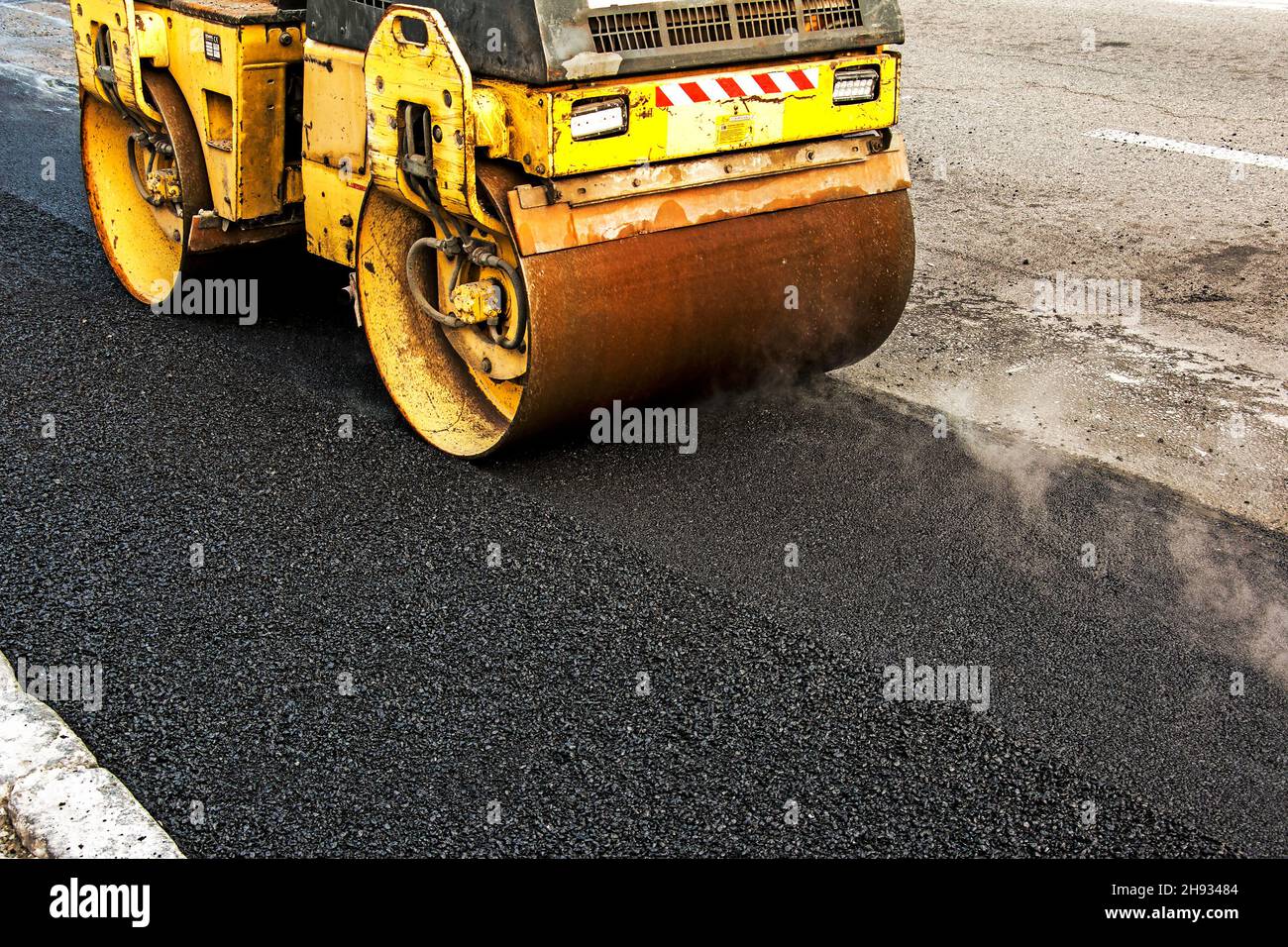 Heavy Steel Hand Roller With Long Handle On Asphalt Surface Stock Photo -  Download Image Now - iStock