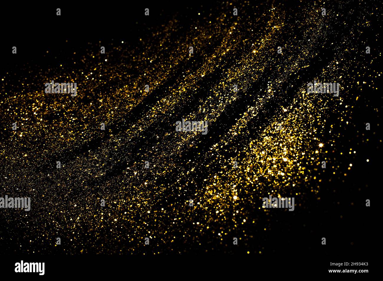 Golden bokeh background. Festive New Year and Christmas shiny glitter ...