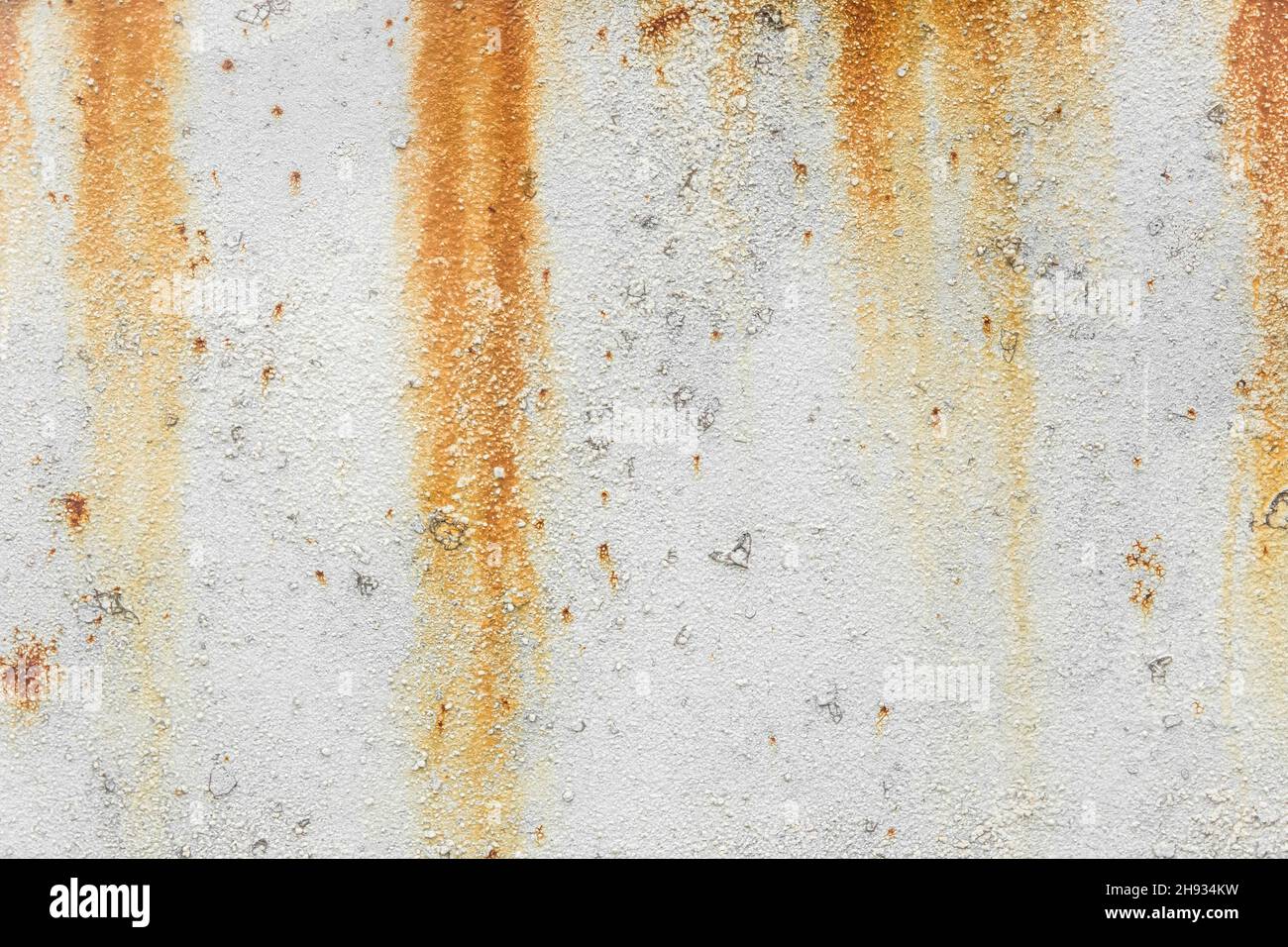 Old white worn metal with traces of dirty rust weathered background ...