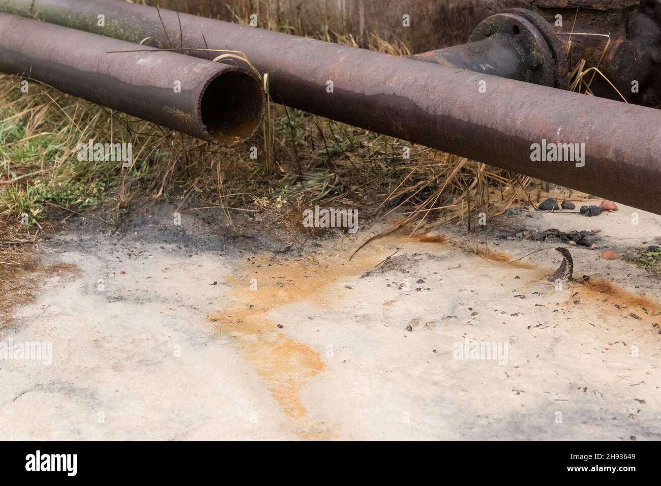 Discharge of chemical toxic waste from an old pipeline. Pollution of the environment and ecology
