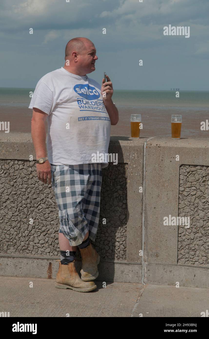 Obese man in shorts hi-res stock photography and images - Alamy