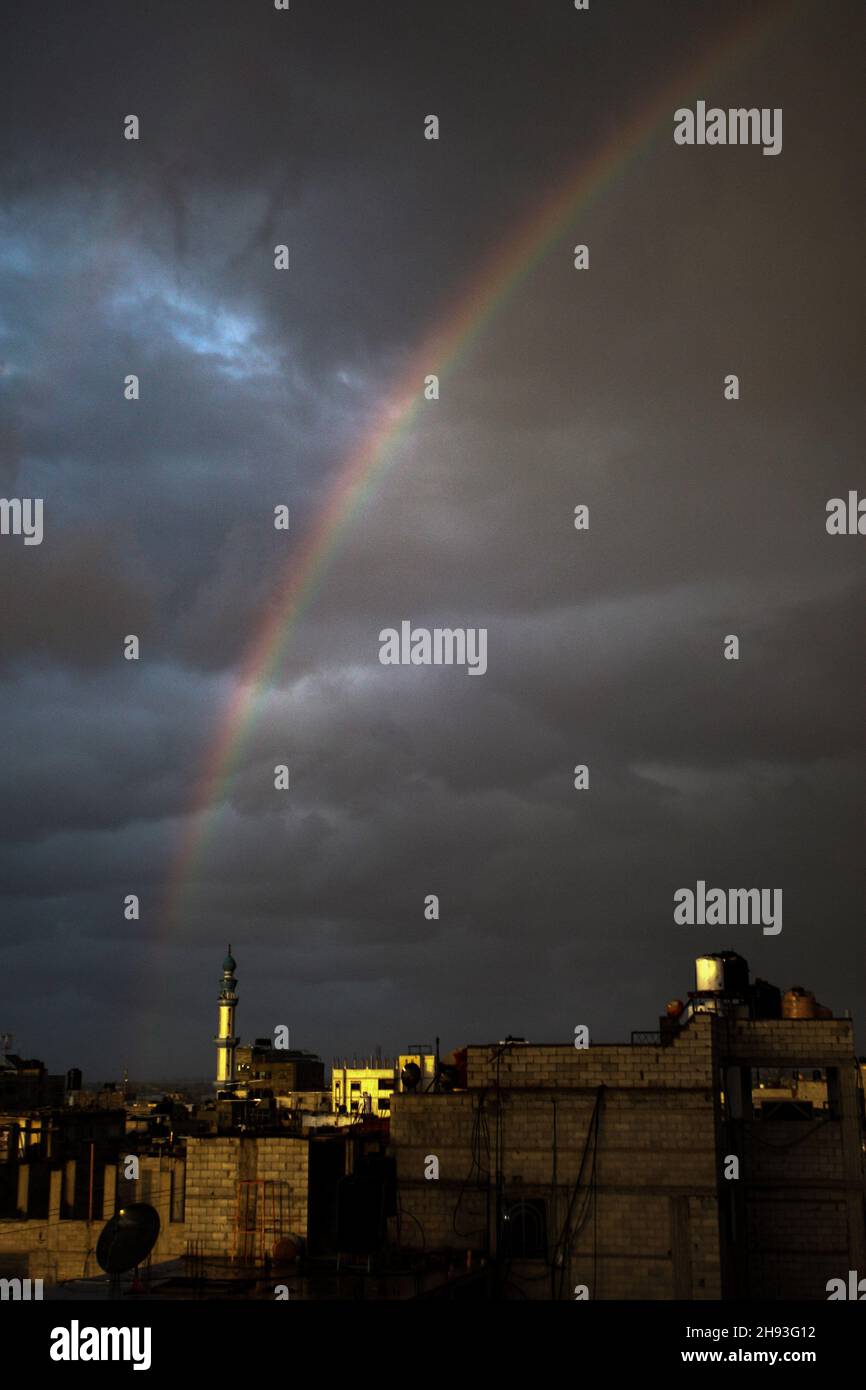 Rafah, Gaza. 03rd Dec, 2021. A rainbow appears over Gaza City on a rainy day on Friday, December 3, 2021. Photo by Ismael Mohamad/UPI Credit: UPI/Alamy Live News Stock Photo