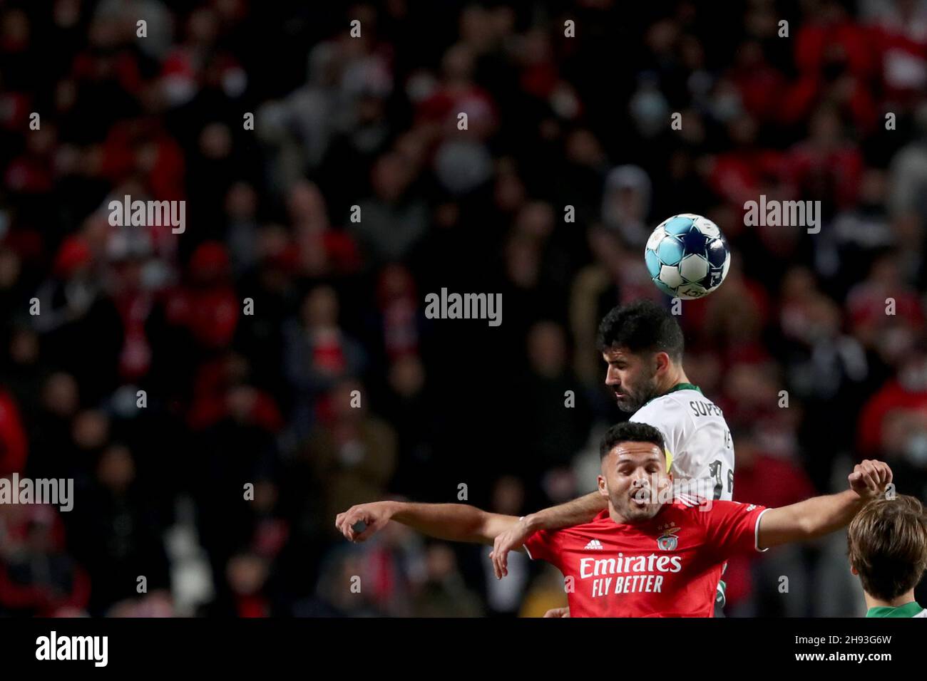 Lisbon, Portugal. 4th Dec, 2021. Goncalo Ramos of SL Benfica vies with Luis Neto of Sporting CP (top) during the Portuguese League football match between SL Benfica and Sporting CP at the Luz stadium in Lisbon, Portugal on December 3, 2021. (Credit Image: © Pedro Fiuza/ZUMA Press Wire) Credit: ZUMA Press, Inc./Alamy Live News Stock Photo