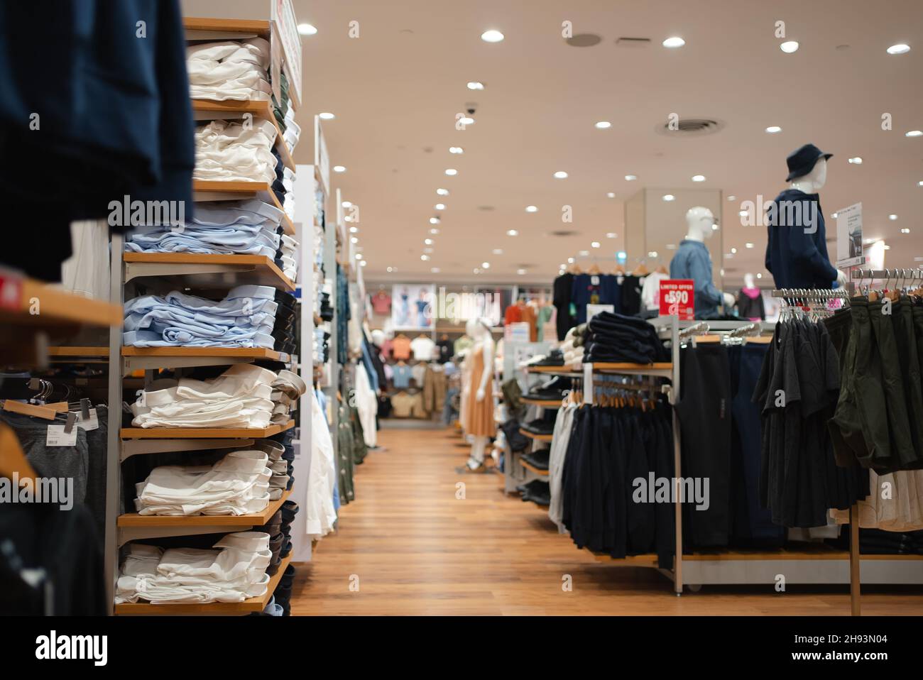 Interior view of clothing store in a shopping mall. Stock Photo