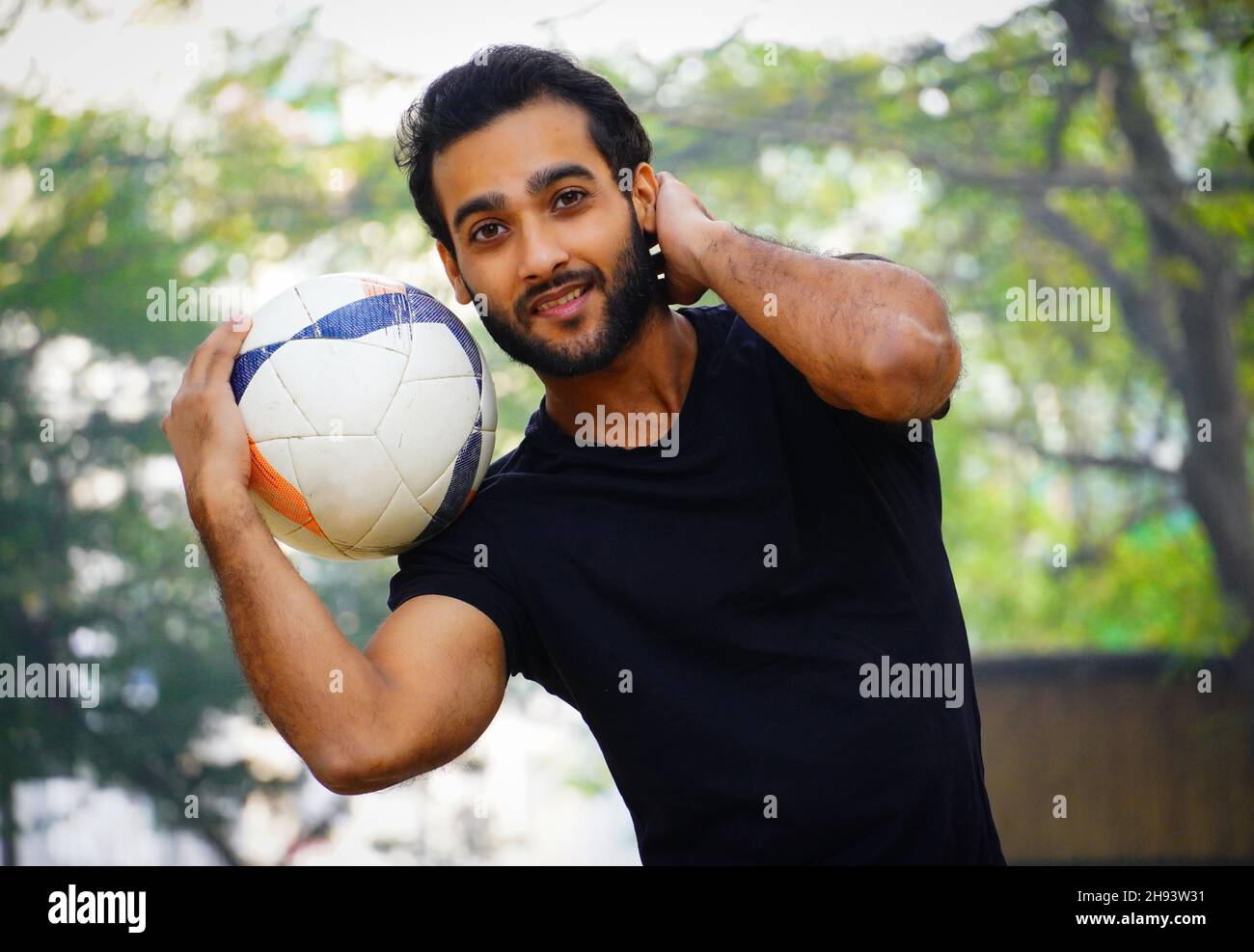 Young football player at the football Ground indian man image Stock