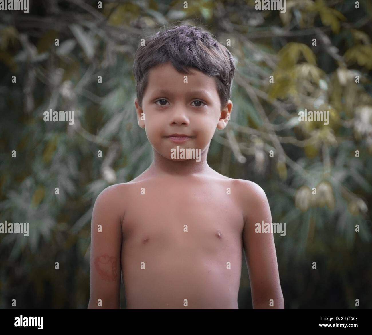 portrait of indian poor child in village Stock Photo