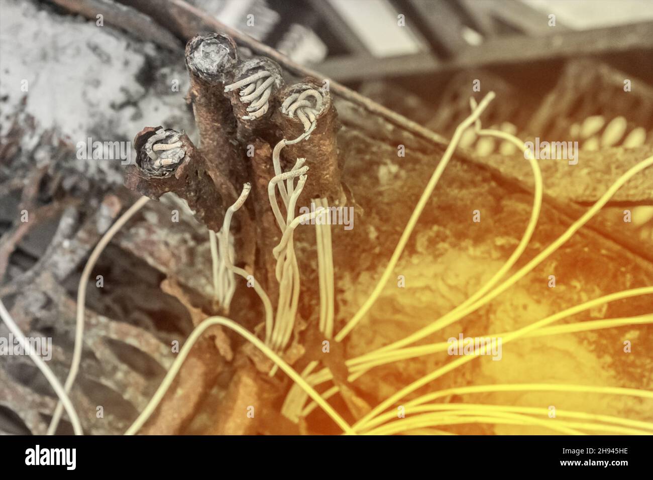 An old, dirty electrical cables wires damaged and broken abandoned