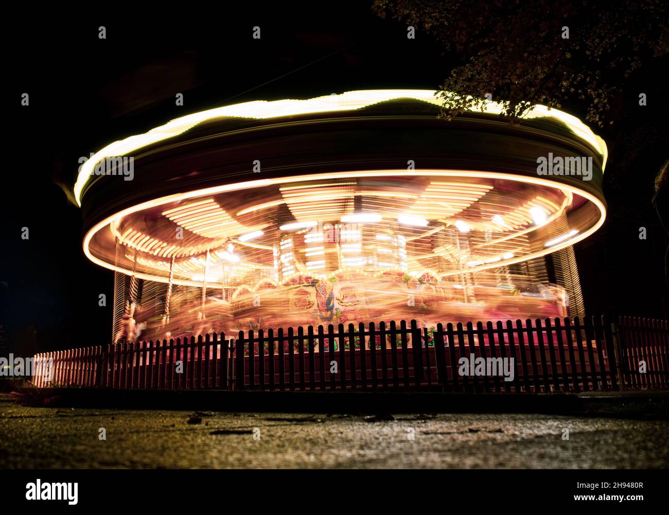 Merry-Go-Round Carousel at Night, Fairground Ride Stock Photo