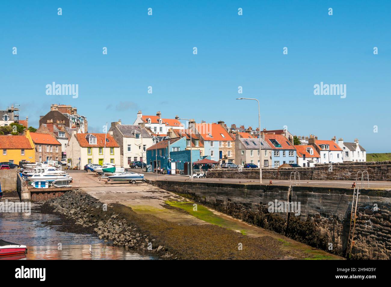 The East Pier and the East Pier Smokehouse at St Monans in the East Neuk of Fife, Scotland. Stock Photo