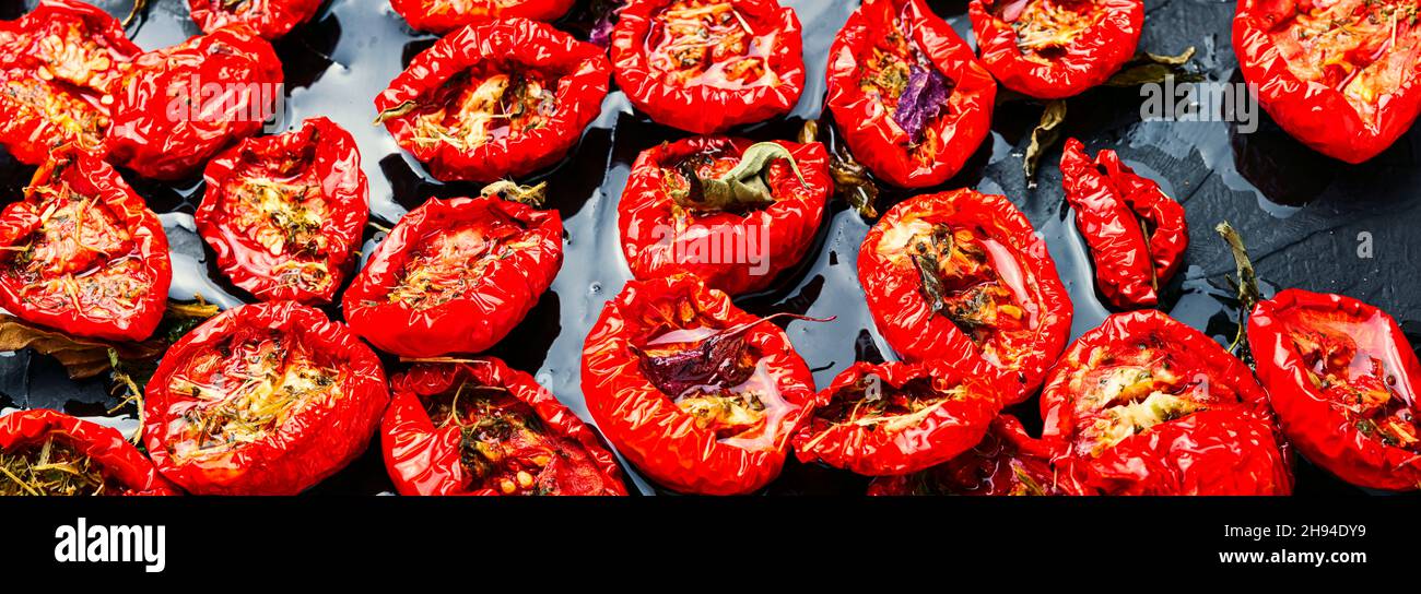 Sun dried tomatoes with herbs and spices Stock Photo Alamy