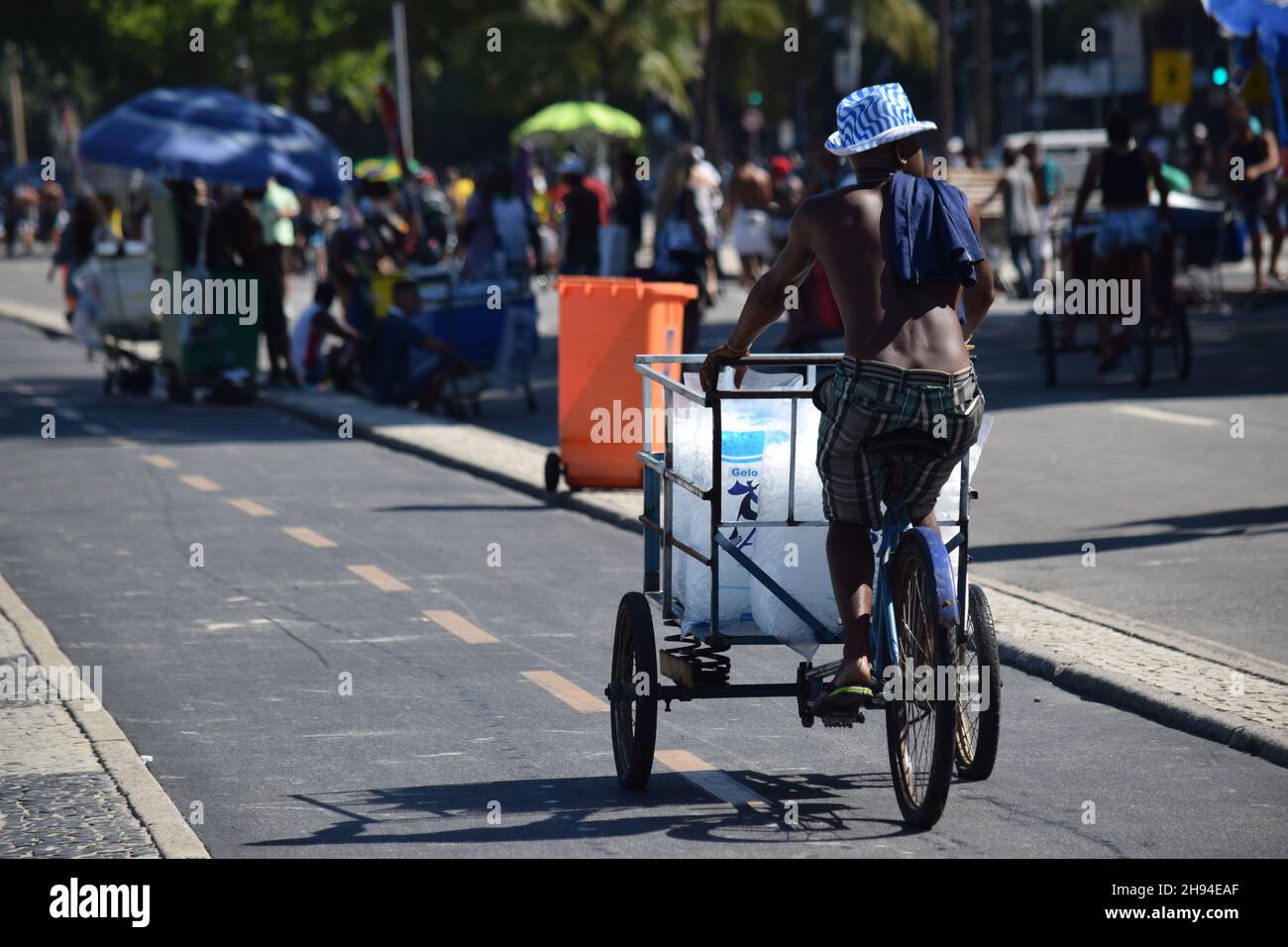 Working In Rio Rio de Janeiro People Working at the beach Stock Photo - Alamy