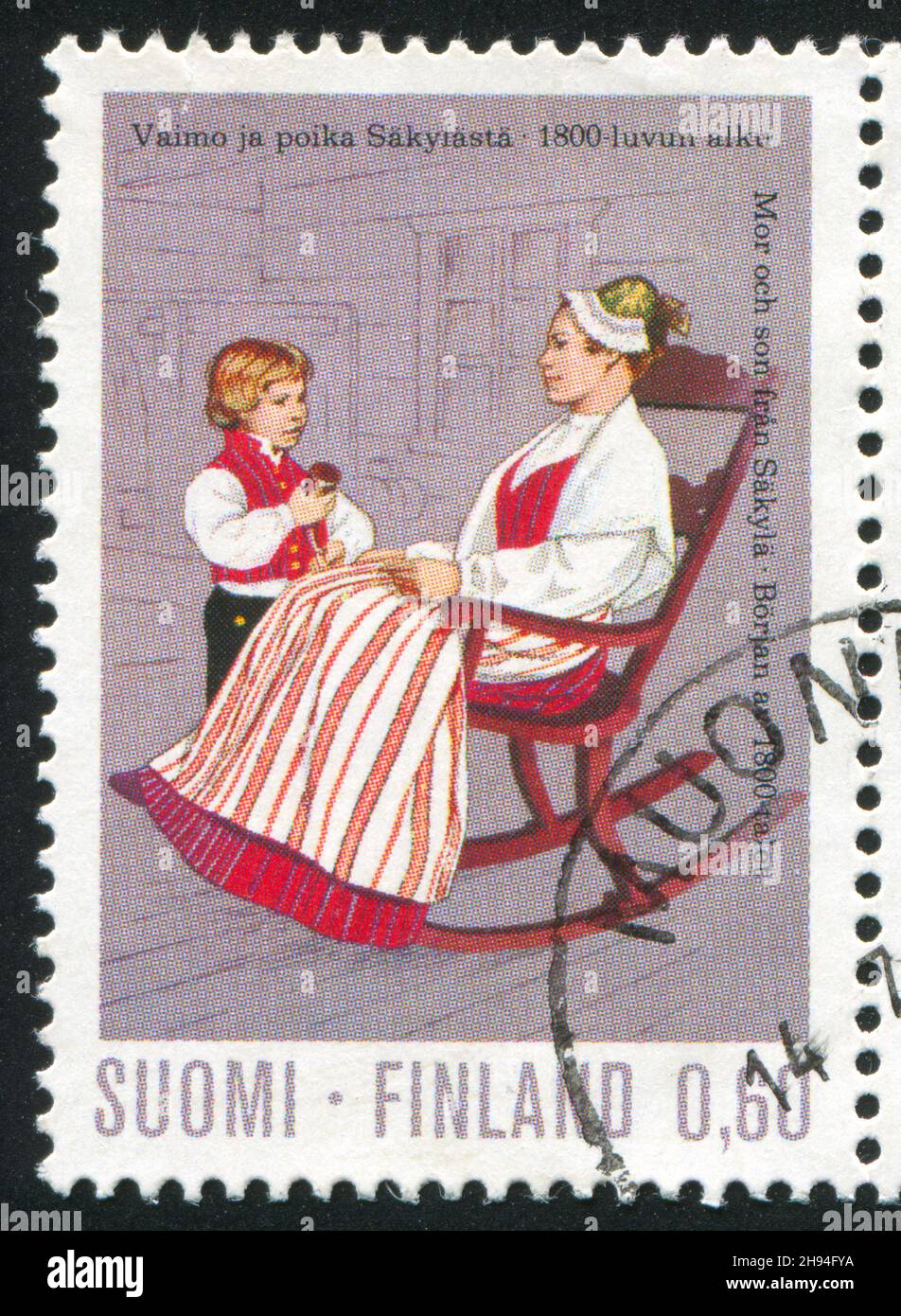 FINLAND - CIRCA 1973: stamp printed by Finland, shows Mother and Son from Satakunta, circa 1973 Stock Photo