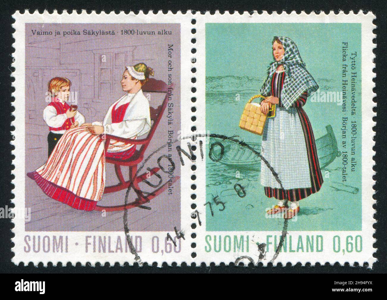 FINLAND - CIRCA 1973: stamp printed by Finland, shows Girl from Heinavesi and Mother and Son from Satakunta, circa 1973 Stock Photo