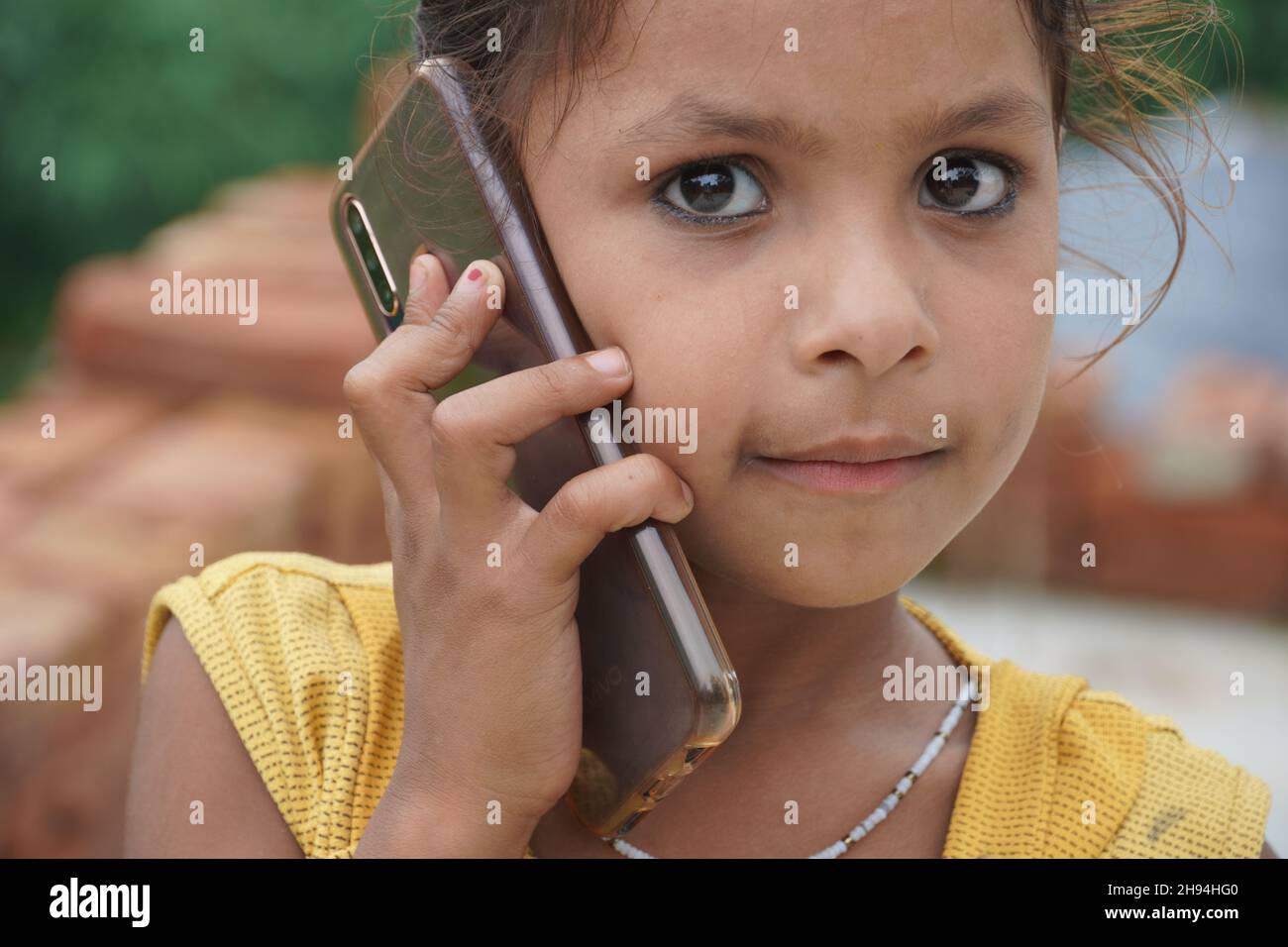 A cute girl talking on mobile phone Stock Photo
