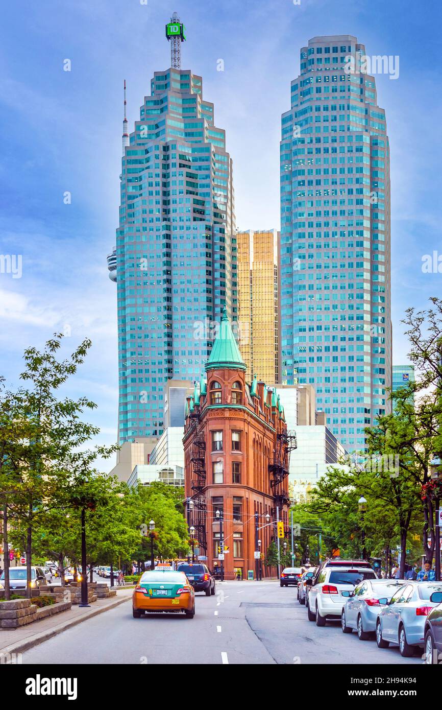 The Gooderham or Flatiron Building (red) in the Old Toronto district. The famous place is a tourist attraction. Nov. 22, 2021 Stock Photo