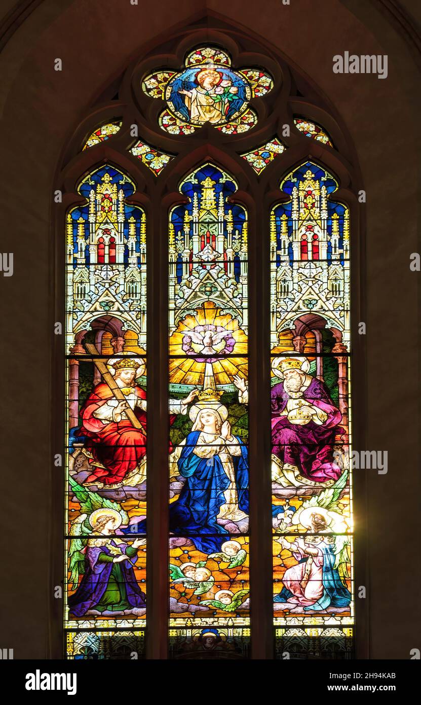 Stained glass window with religious themed images inside of the Saint Michael Catholic Cathedral.Nov. 22, 2021 Stock Photo