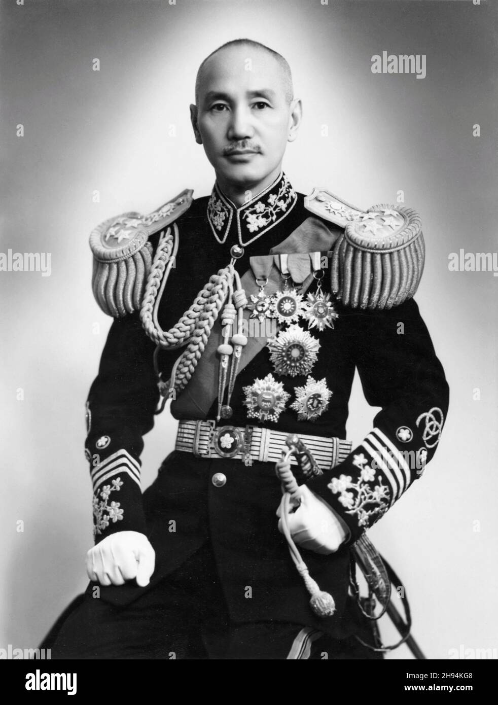 CHINA - circa 1930 - Formal studio portrait of Chiang Kai-Shek dressed in the uniform of the Commander-in-Chief of the Chinese National Revolutionary Stock Photo