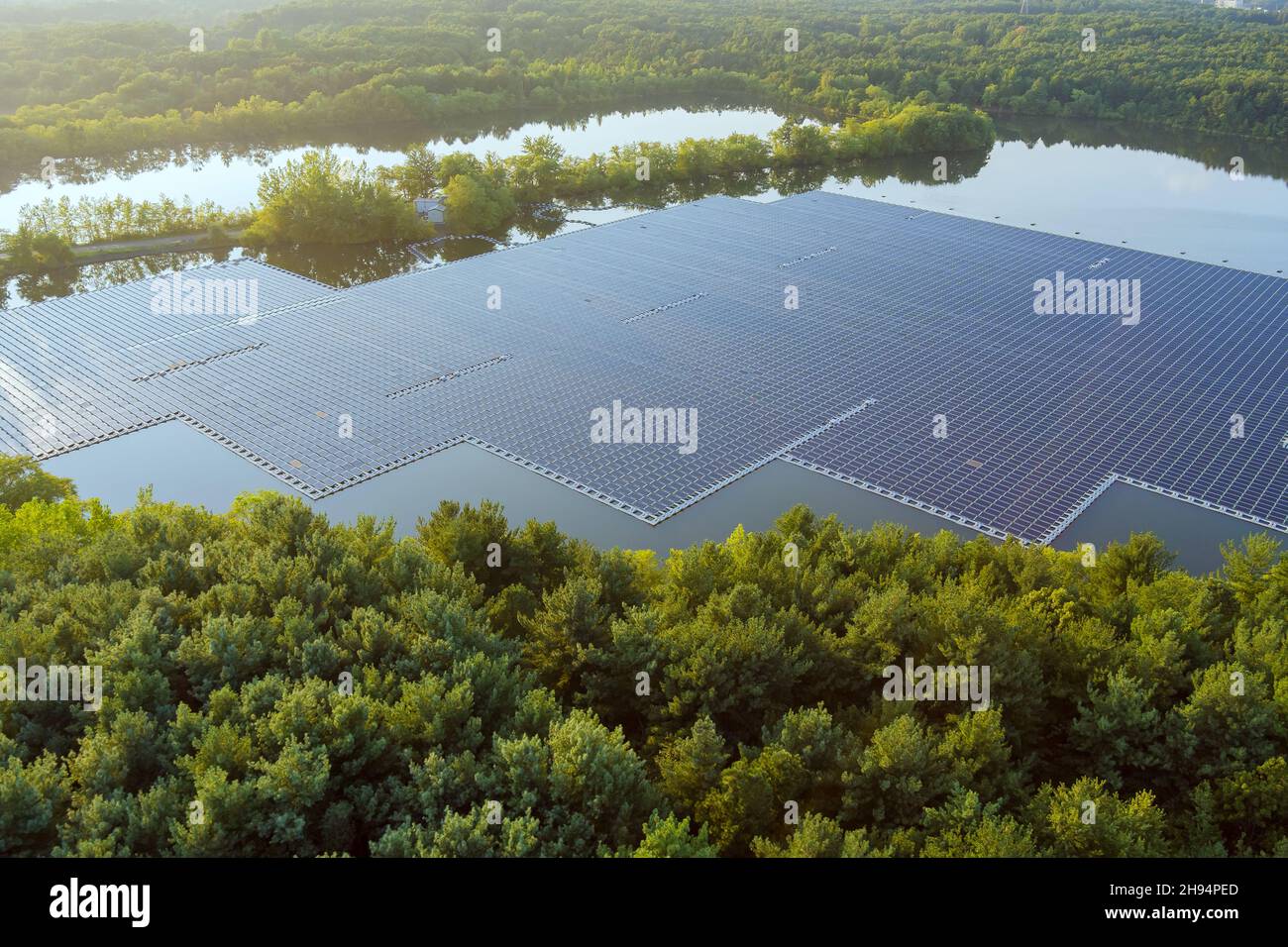Spring Lake Panel Aerial view of floating solar panels platform system on the lake Stock ...