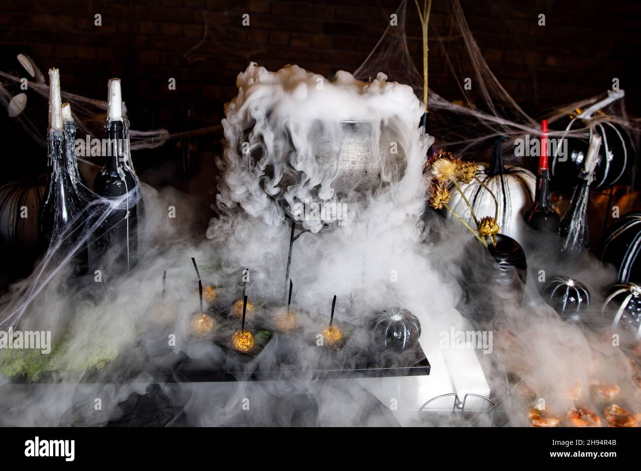 The process of brewing a potion in a cauldron Stock Photo Alamy
