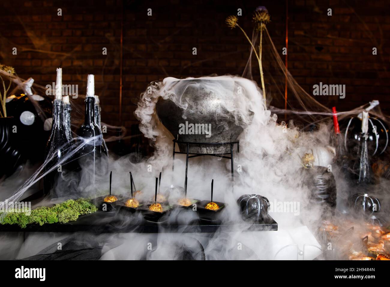 The process of brewing a potion in a cauldron Stock Photo Alamy