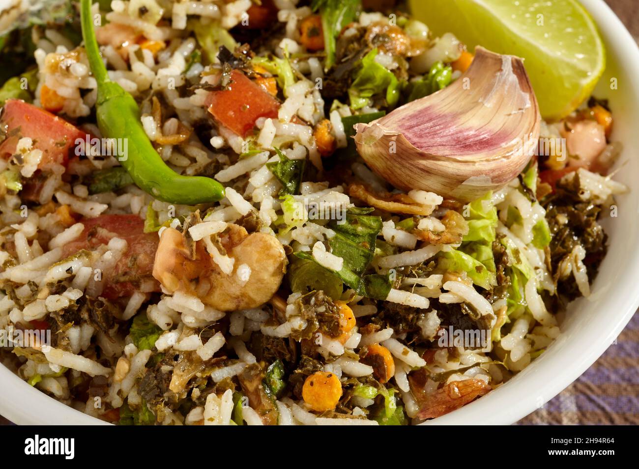 Lahpet Thoke or Burmese tea leaf salad. A classic dish from Myanmar. Stock Photo