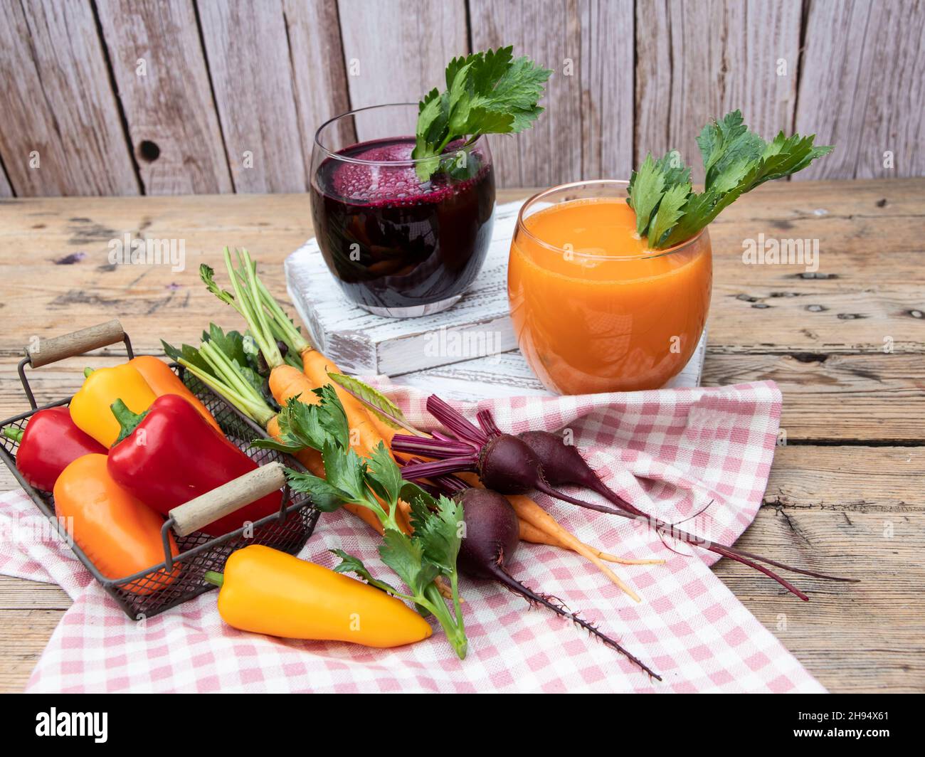 Fresh squeezed smoothie bell pepper, carrot, beetroot juice vegetable in a glass. Top view. Healthy eating, detox, dieting. Stock Photo