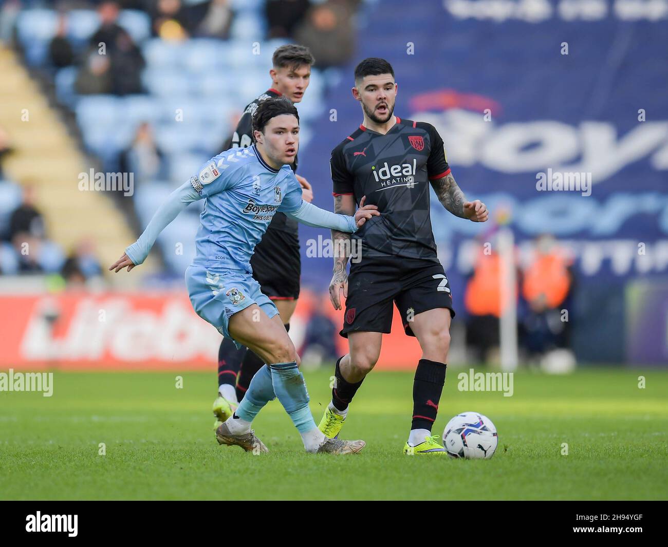 Callum O'Hare #10 of Coventry City battles Alex Mowatt #27 of West Bromwich Albion for the ball on the half way line. Stock Photo