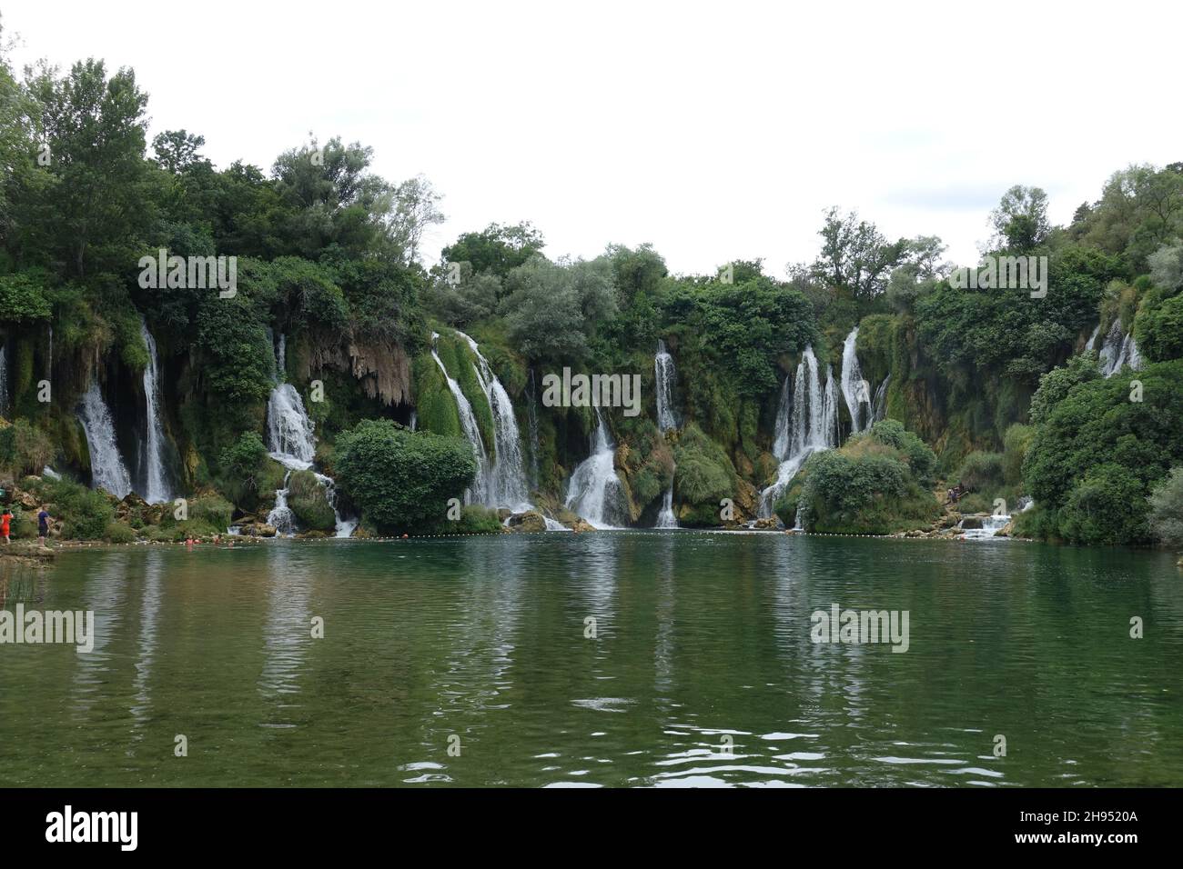 Kravica Waterfall is a large tufa cascade on the Trebižat River, in the karstic heartland of Herzegovina in Bosnia Stock Photo