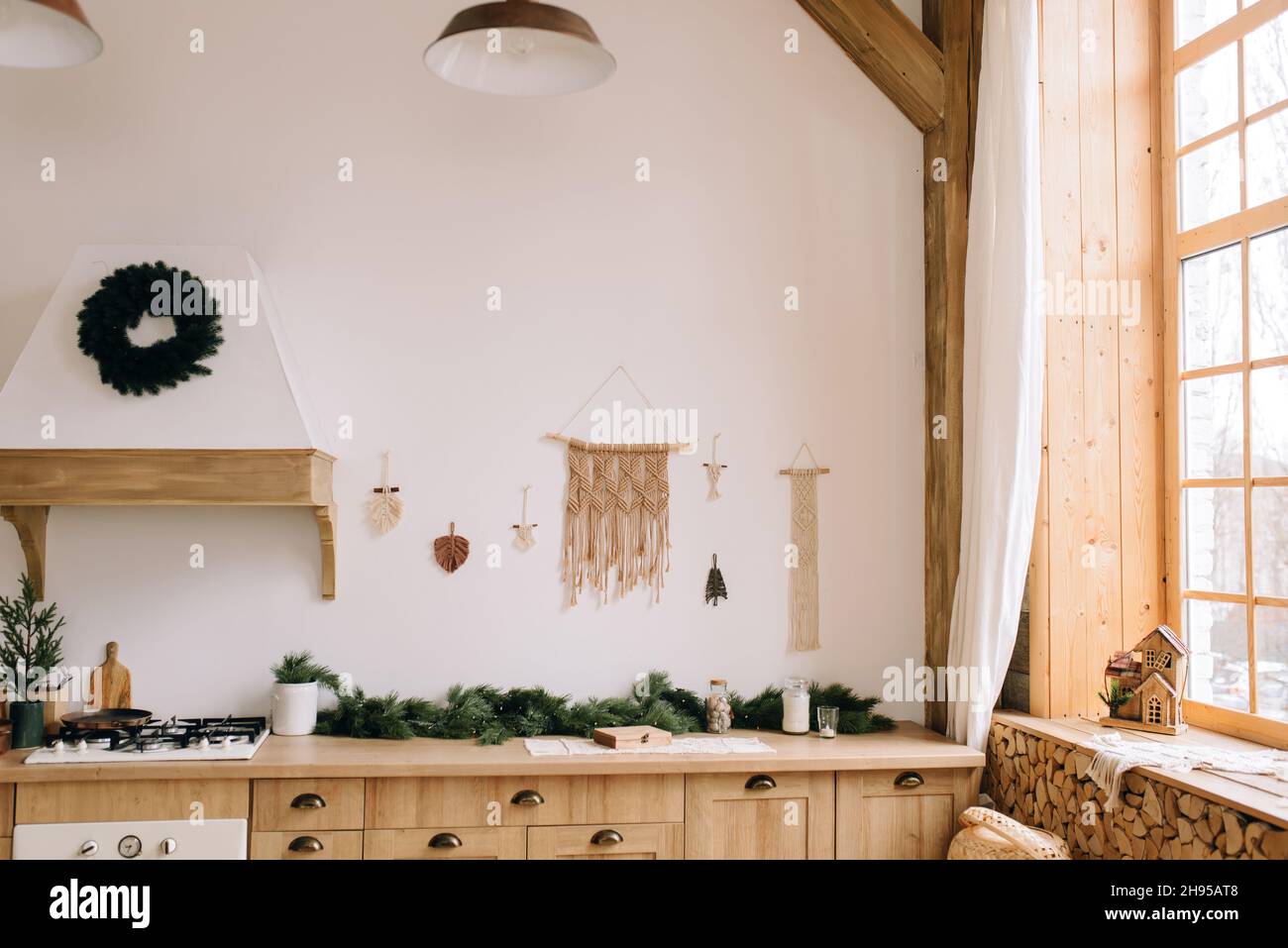Beautiful white kitchen in Scandinavian style with Christmas decor Stock Photo