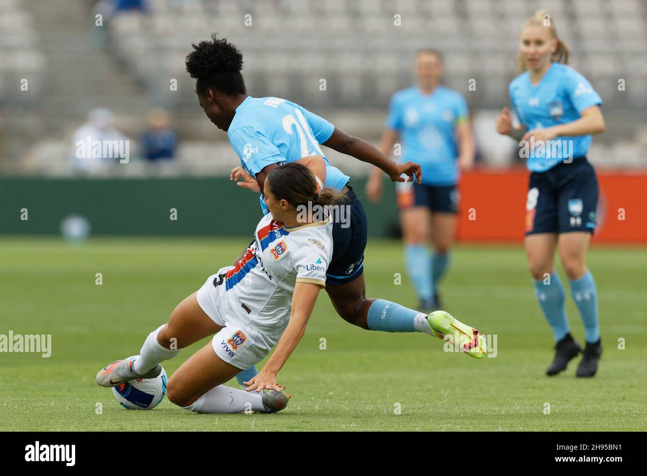 Tiana Jaber of the Newcastle Jets challenges Princess Ibini-Isei of Sydney FC during the A-League soccer match between Sydney FC and Newcastle Jets on December 4, 2021 at Netstrata Jubilee Stadium in Sydney, Australia Stock Photo