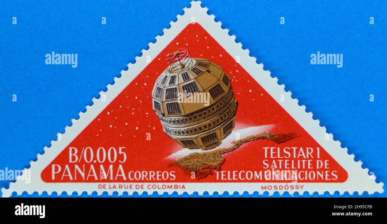 Photo of a red triangular postage stamp from Panama featuring an illustration of a Telstar communications satellite Stock Photo